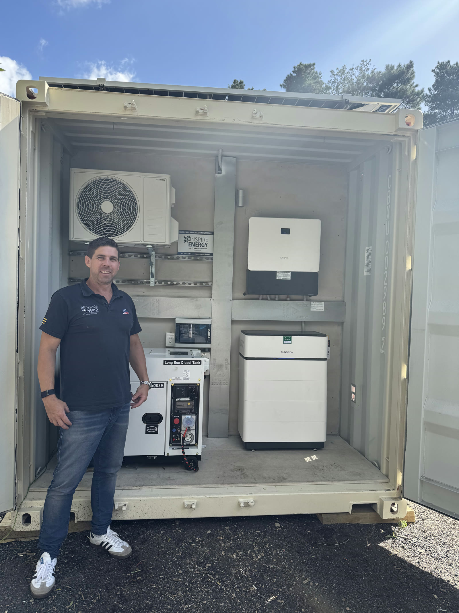 Open Eco Cube showing solar, battery and generator
