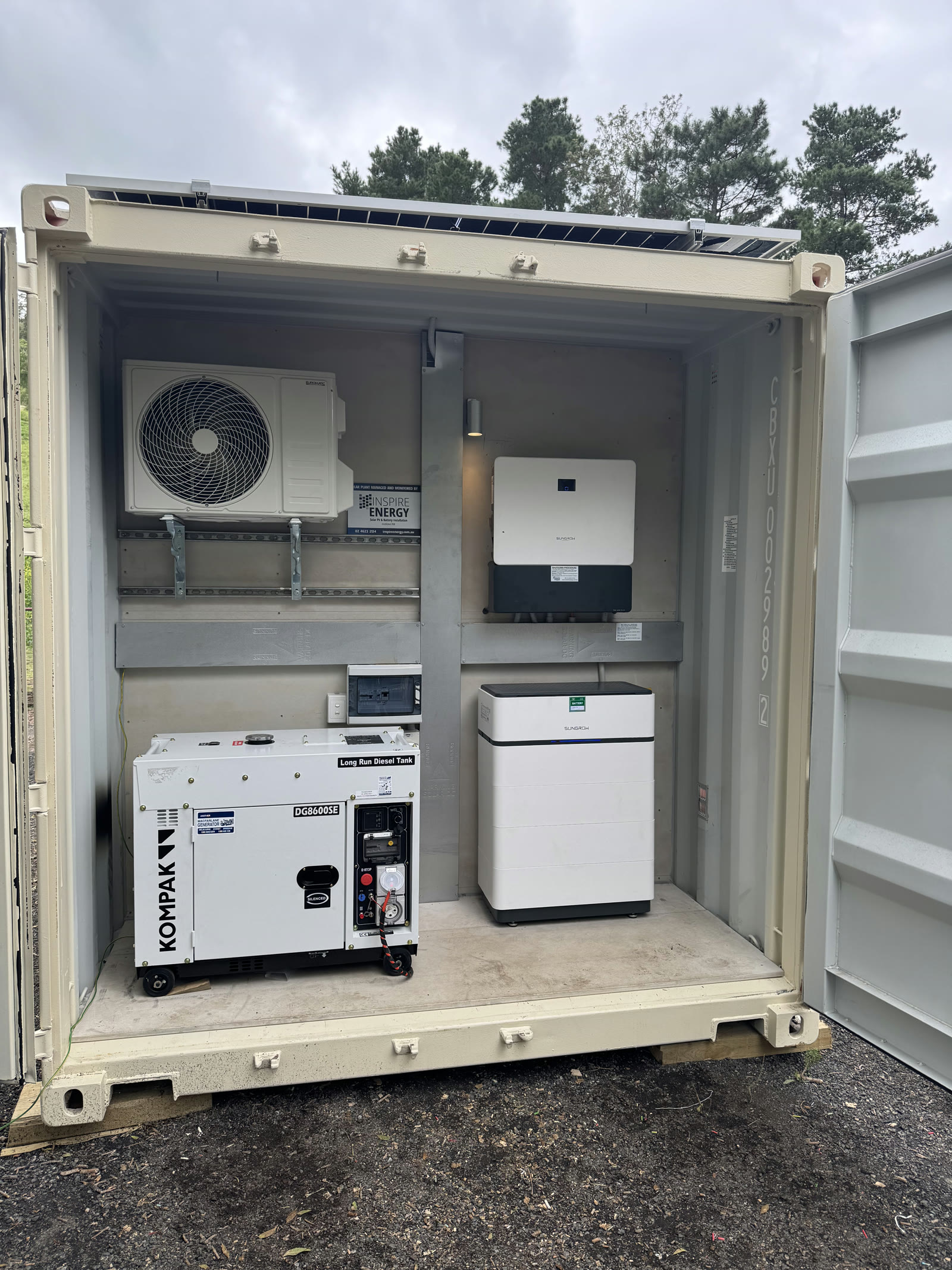 Inside an Eco Cube: solar inverter, battery storage, generator backup and air conditioning